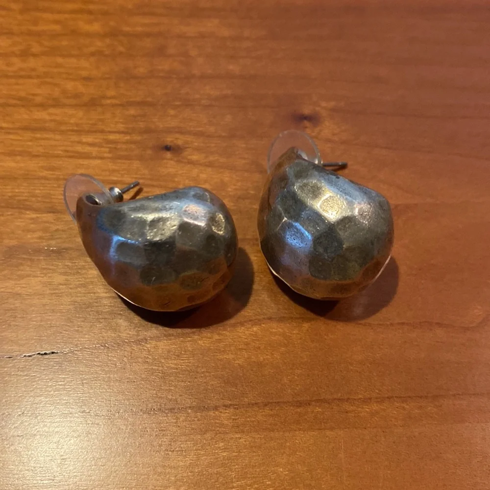 10 pairs of silver tone earrings
